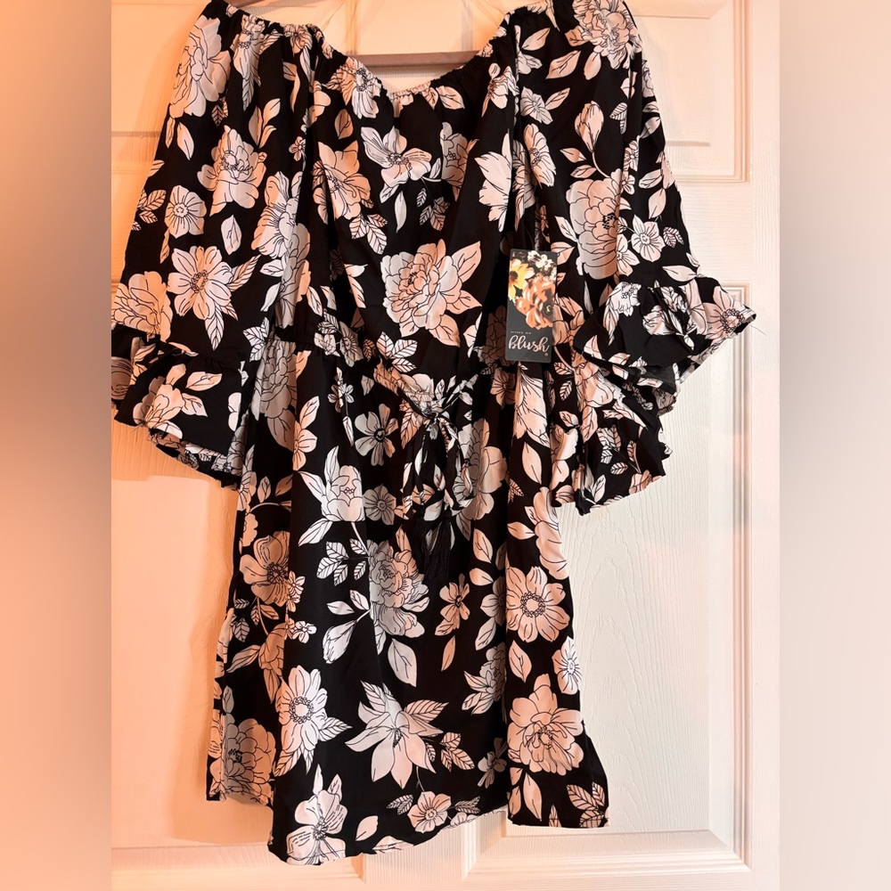 Blush Black and White Floral dress can be worn off the shoulders.